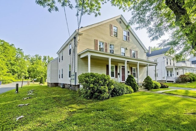 734 Main St, Amherst, MA 01002 - view of front of property with a front yard and a porch