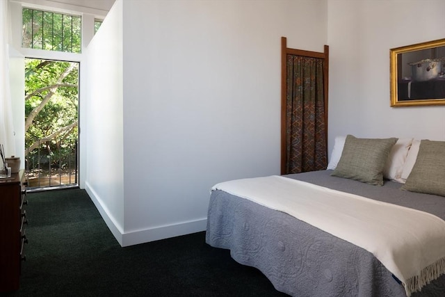 543 Green St, Cambridge, MA 02139 - carpeted bedroom featuring multiple windows
