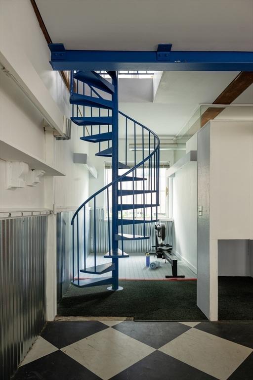 543 Green St, Cambridge, MA 02139 - stairway featuring carpet floors and plenty of natural light