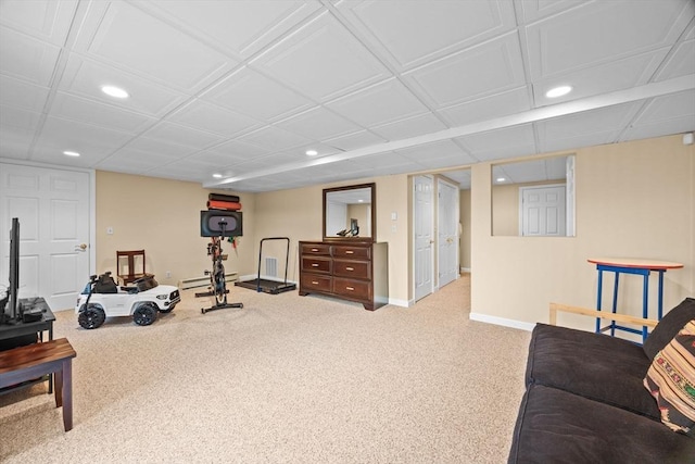 workout area featuring light colored carpet