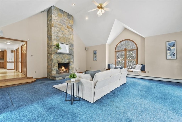 living room with carpet, a fireplace, ceiling fan, a baseboard radiator, and high vaulted ceiling