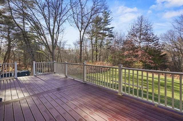 wooden deck with a yard