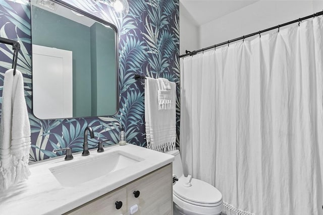 4 Payne St One, Unit One, Boston, MA 02122 - full bathroom featuring vanity, toilet, and wallpapered walls