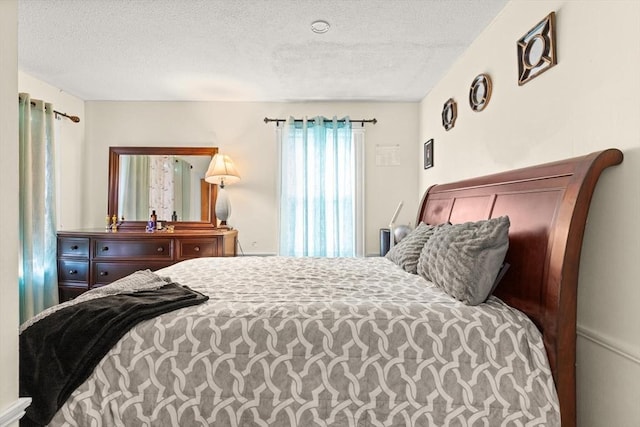 bedroom with a textured ceiling