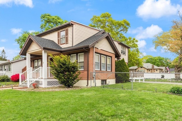 view of front of property with a porch, brick siding, and roof with shingles