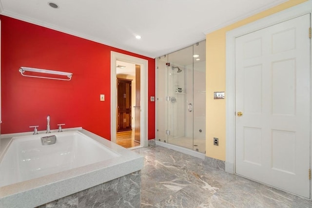 full bathroom with a sink, marble finish floor, a bath, a stall shower, and crown molding