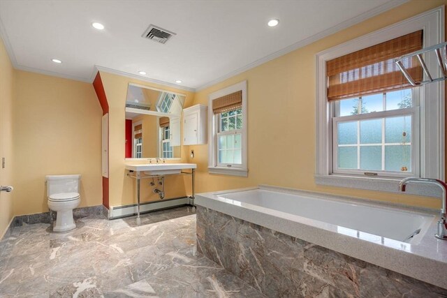 bathroom with toilet, crown molding, vanity, baseboard heating, and tiled bath