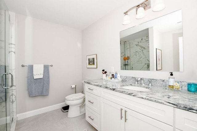 34 Split Rock Ln, Mattapoisett, MA 02739 - full bathroom featuring a marble finish shower, toilet, baseboards, and vanity