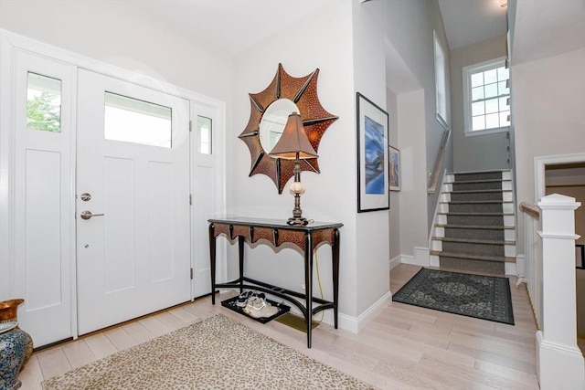 34 Split Rock Ln, Mattapoisett, MA 02739 - foyer featuring light wood-type flooring and stairs