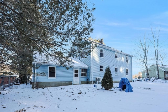 view of snow covered house