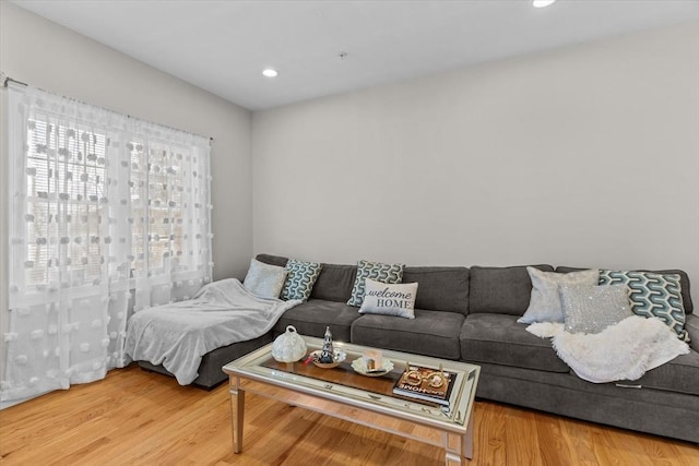 living area featuring recessed lighting and wood finished floors