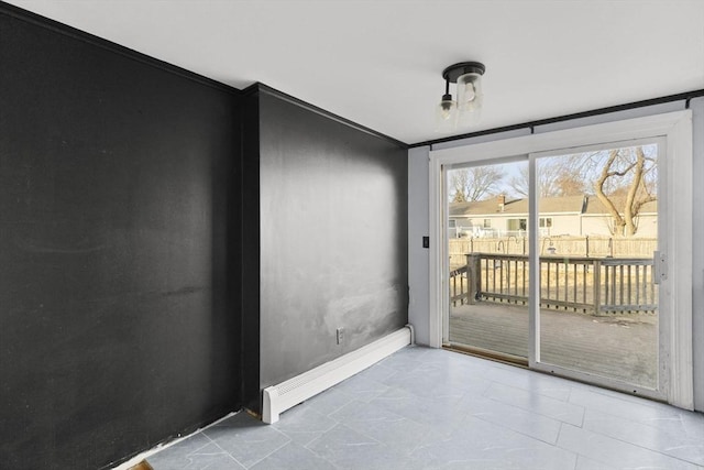 doorway to outside featuring crown molding