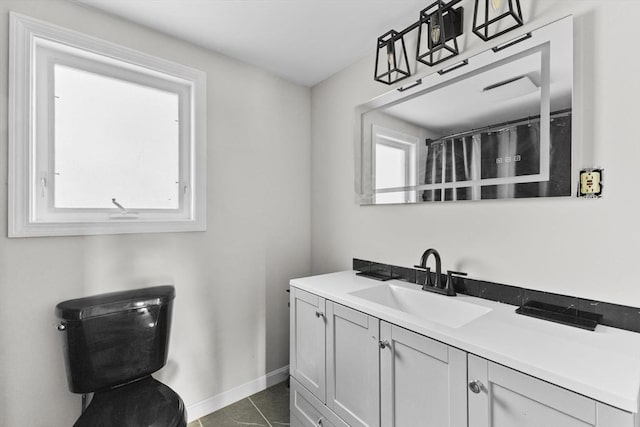 bathroom featuring vanity and tile patterned flooring