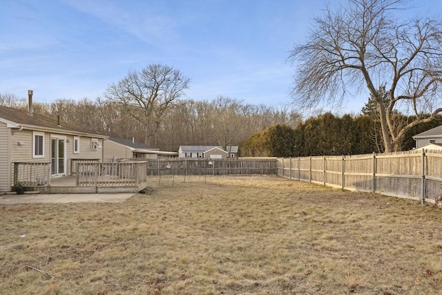 view of yard featuring a deck