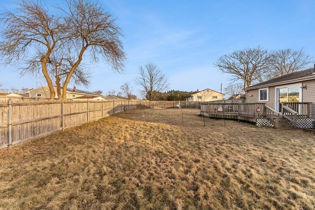 view of yard featuring a wooden deck