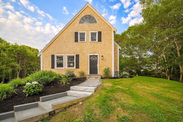 66 S W Dr, Dennis, MA 02638 - view of front of house with a front yard