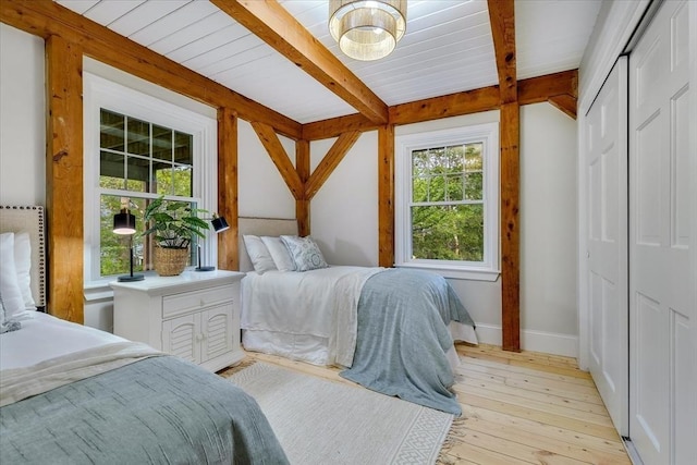 66 S W Dr, Dennis, MA 02638 - bedroom featuring light wood-type flooring and beamed ceiling
