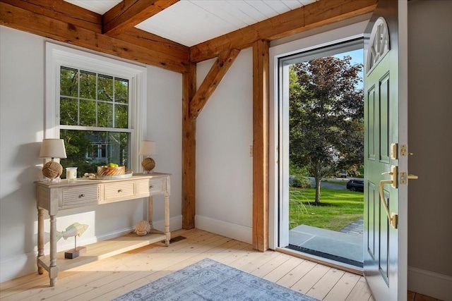 66 S W Dr, Dennis, MA 02638 - entryway with light wood-style floors, plenty of natural light, and beamed ceiling