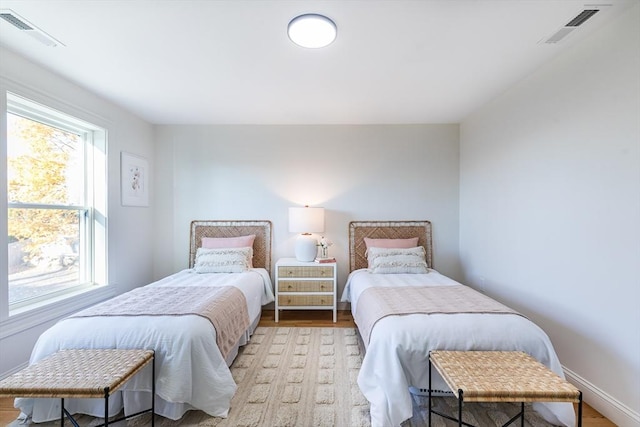 bedroom featuring light wood-type flooring