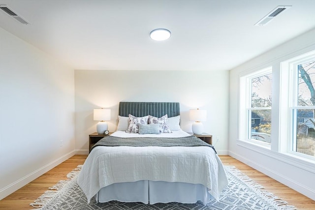 bedroom featuring light hardwood / wood-style floors