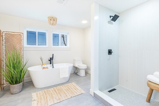 bathroom with toilet and separate shower and tub