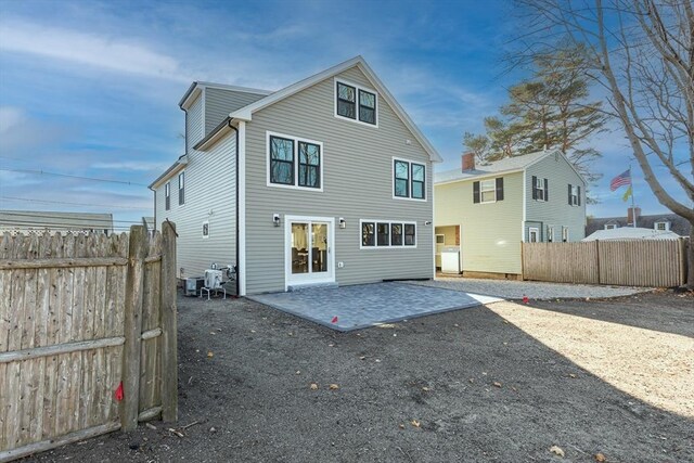 back of house featuring a patio area