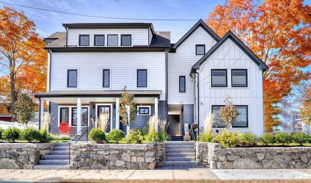 148 Myrtle Unit 1, Melrose, MA 02176 - view of front facade with stairway and covered porch