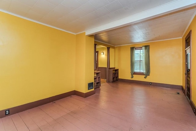 52 Maple St, Belchertown, MA 01007 - empty room with crown molding and wood-type flooring