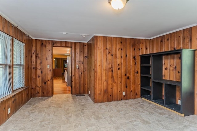 52 Maple St, Belchertown, MA 01007 - unfurnished room with wooden walls, crown molding, and tile patterned floors
