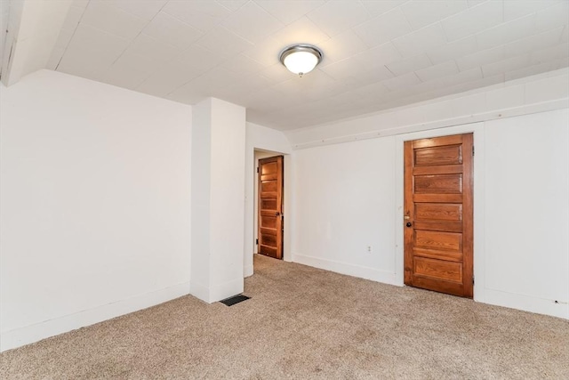 52 Maple St, Belchertown, MA 01007 - empty room with carpet floors and lofted ceiling