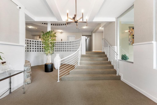 53 Melrose St Unit 7F, Melrose, MA 02176 - staircase featuring carpet floors, a chandelier, and beamed ceiling
