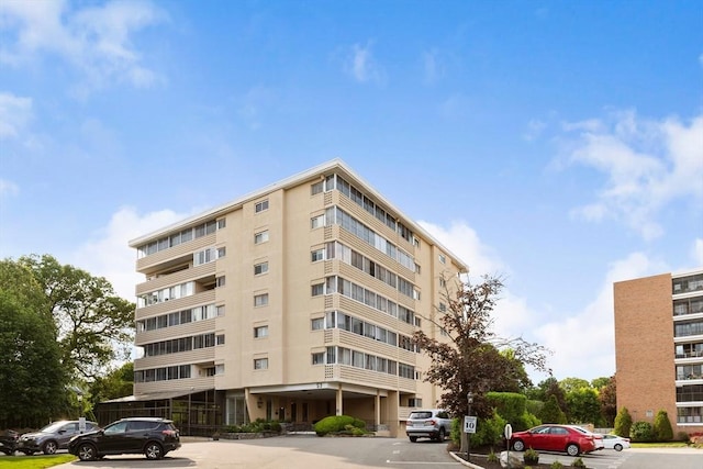 53 Melrose St Unit 7F, Melrose, MA 02176 - view of building exterior featuring uncovered parking