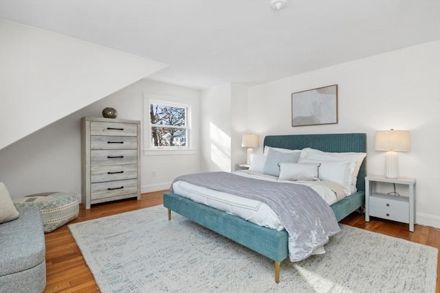 bedroom featuring hardwood / wood-style flooring