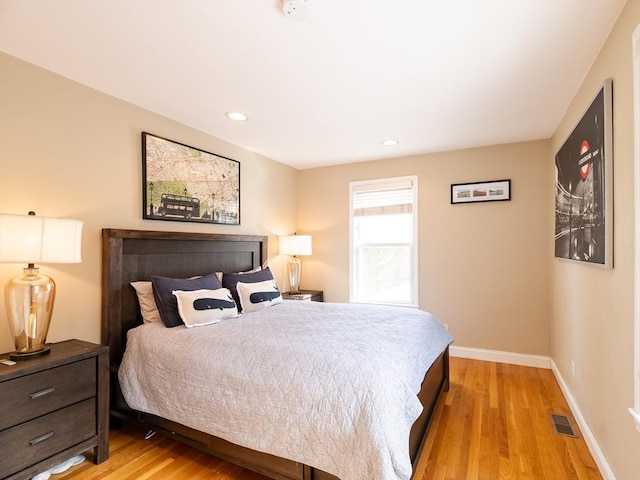 bedroom featuring light wood-type flooring