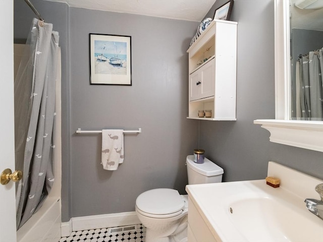 full bathroom with vanity, toilet, and shower / bath combo with shower curtain