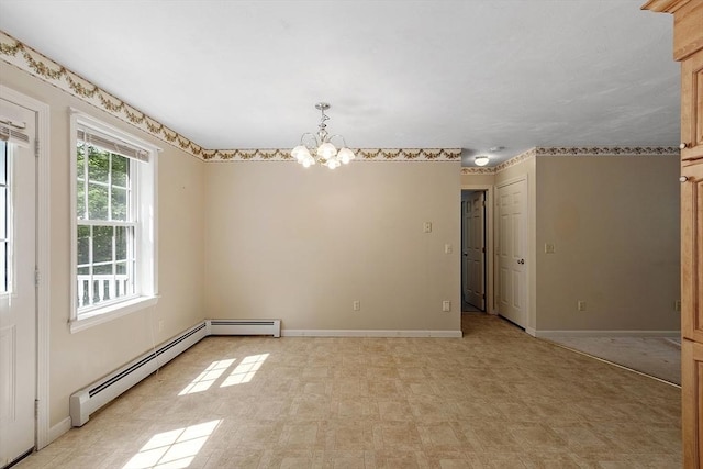 43 Warwick Rd, Gardner, MA 01440 - spare room with a chandelier, a baseboard radiator, baseboards, and light flooring