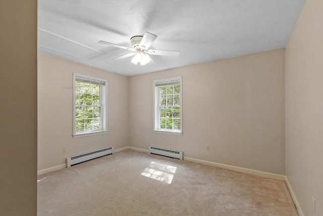 43 Warwick Rd, Gardner, MA 01440 - empty room with a baseboard heating unit, attic access, and healthy amount of natural light