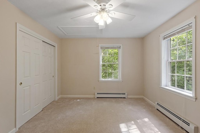 43 Warwick Rd, Gardner, MA 01440 - unfurnished bedroom with baseboard heating, attic access, carpet, and baseboards
