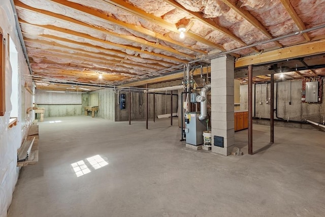 43 Warwick Rd, Gardner, MA 01440 - unfinished below grade area with electric panel and water heater