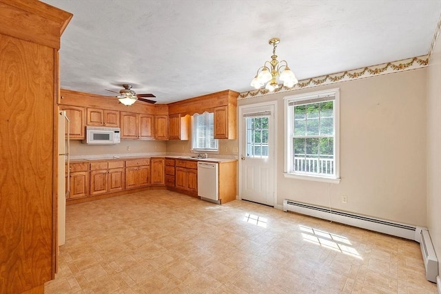 43 Warwick Rd, Gardner, MA 01440 - kitchen with white appliances, a baseboard heating unit, light countertops, a chandelier, and light flooring