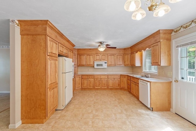 43 Warwick Rd, Gardner, MA 01440 - kitchen with white appliances, a sink, light countertops, ceiling fan, and light floors