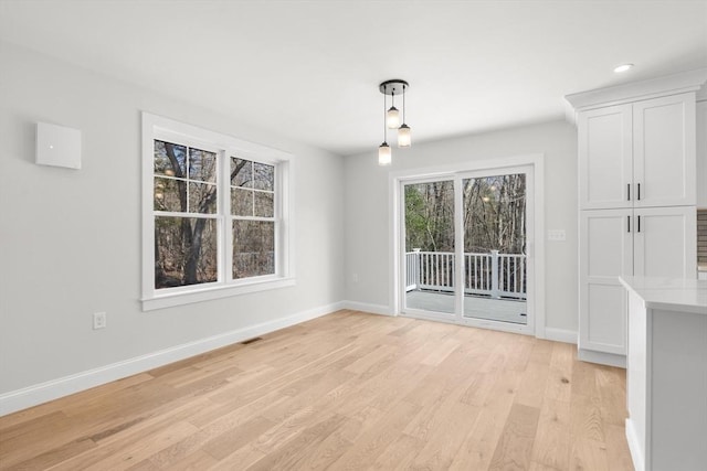 9 Patten Rd, Norton, MA 02766 - unfurnished dining area with light wood-style floors and recessed lighting