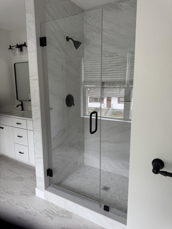 9 Patten Rd, Norton, MA 02766 - bathroom with vanity, a shower stall, and marble look tile flooring