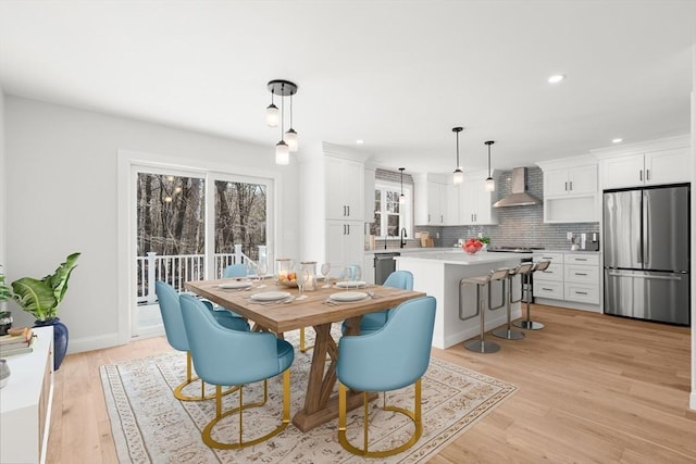 9 Patten Rd, Norton, MA 02766 - dining space with light wood-style floors and recessed lighting