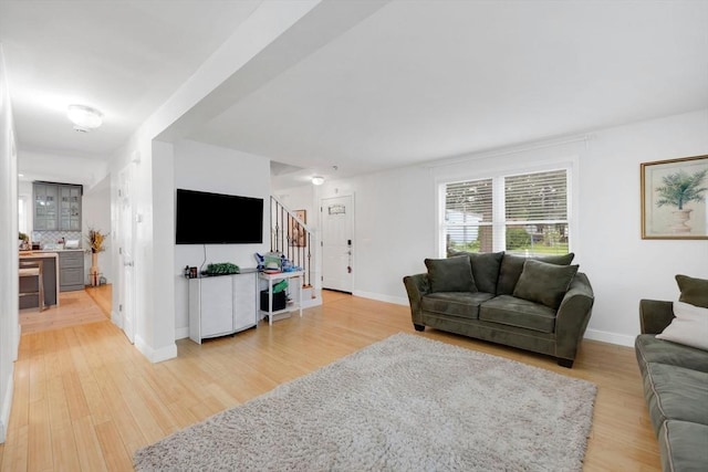 45 Olney Ave, Springfield, MA 01119 - living area with stairs and light wood-style floors