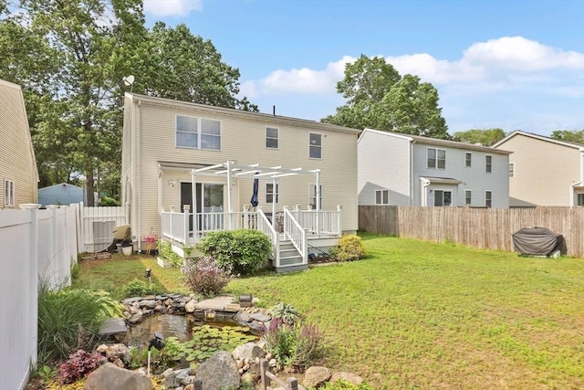 45 Olney Ave, Springfield, MA 01119 - back of house featuring a pergola, a wooden deck, and a fenced backyard