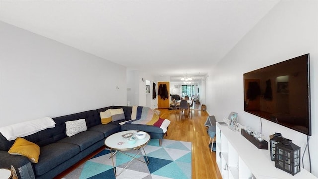 10 Williams St Unit 26, Watertown, MA 02472 - living room with light wood-style flooring and a chandelier