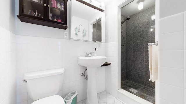 10 Williams St Unit 26, Watertown, MA 02472 - full bathroom featuring tile walls, a stall shower, and toilet
