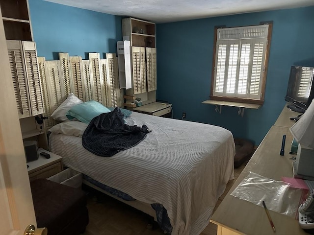 bedroom with parquet floors