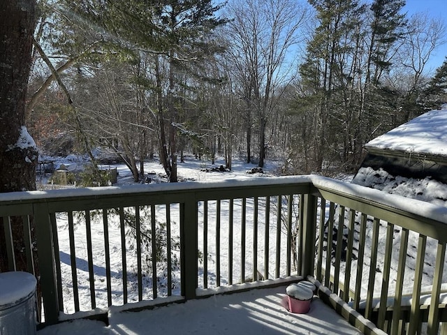 view of snow covered deck